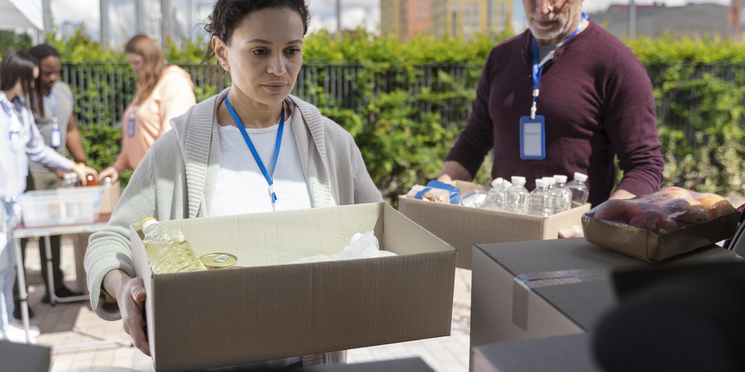 group-different-people-volunteering-foodbank-poor-people